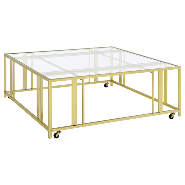  Coaster Furniture Adri 710188 Square Glass Top Coffee Table with Casters - Matte Brass IMAGE 1